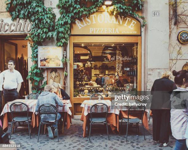 pizzeria, rome - italy - italy restaurant stock pictures, royalty-free photos & images