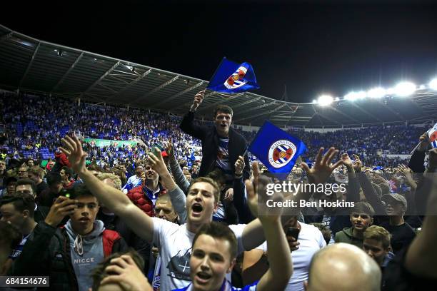Reading fans celebrate on the pitch following the Sky Bet Championship Play Off Second Leg match between Reading and Fulham at Madejski Stadium on...