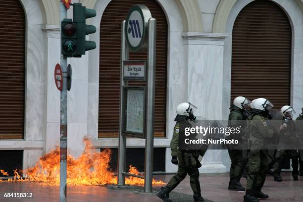 Molotov cocktails thrown to riot police officers, by protestors, after a protest march in central Athens on Wednesday May 17, 2017. Thousands...