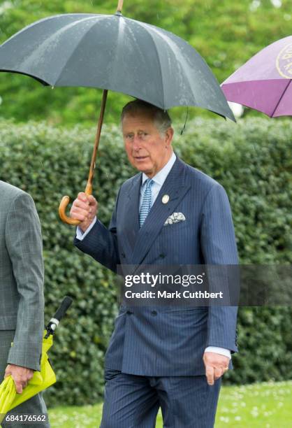 Prince Charles, Prince of Wales views the Great Broad Walk Borders at Kew Gardens on May 17, 2017 in London, England.