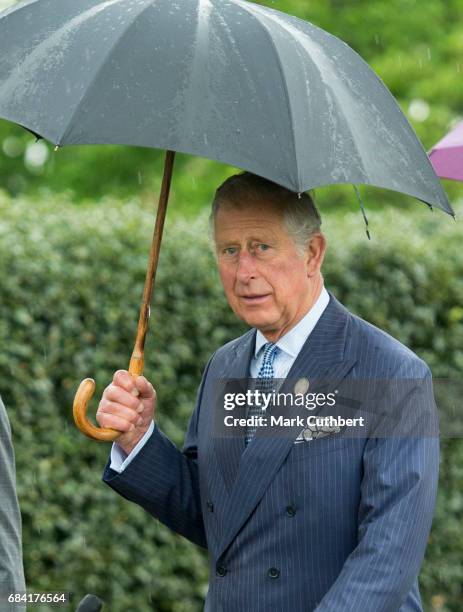 Prince Charles, Prince of Wales views the Great Broad Walk Borders at Kew Gardens on May 17, 2017 in London, England.