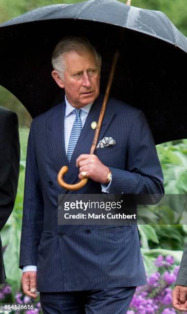 Prince Charles, Prince of Wales views the Great Broad Walk Borders at Kew Gardens on May 17, 2017 in London, England.