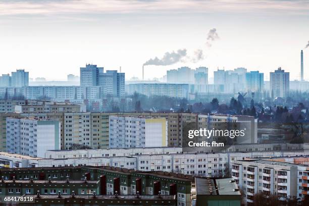 residential district berlin marzahn with smoke stacks and exhausts - schornstein stock-fotos und bilder