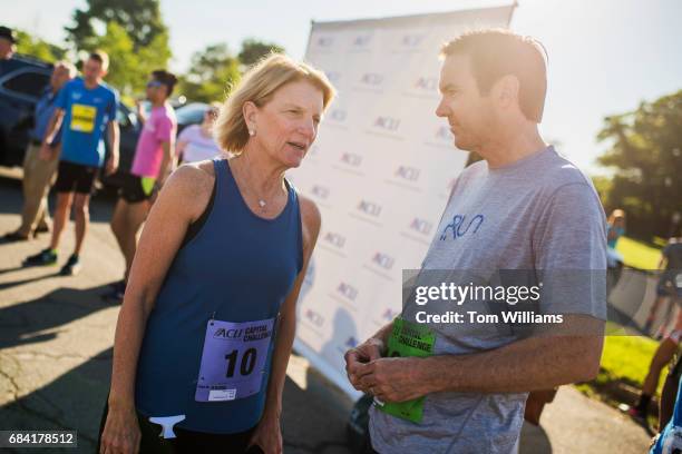 Sen. Shelley Moore Capito, R-W.Va., and Rep. Evan Jenkins, R-W.Va., talk before the ACLI Capital Challenge 3 Mile Team Race in Anacostia Park, May...