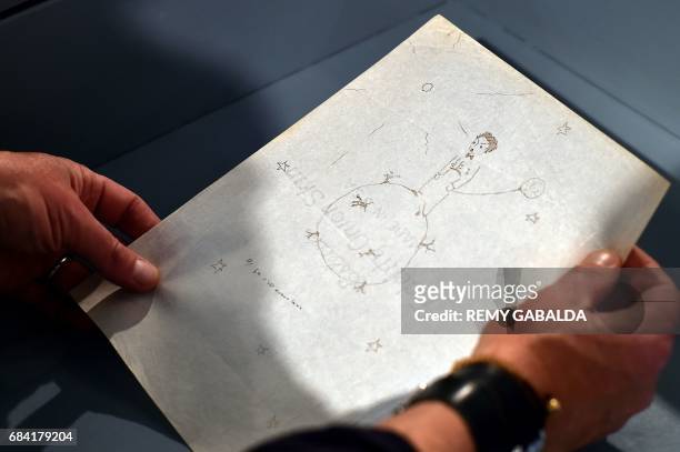 Drawing by Frenchman Antoine de Saint-Exupéry is shown at the Museum of Old Toulouse on May 17 prior to the set of 12 drawings and 7 letters by...