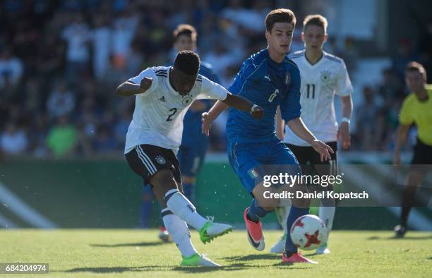 Alfons Amade of Germany is challenged by Matteo Gabbia of Italy during the U18 International Friendly match between Germany and Italy on May 17, 2017...