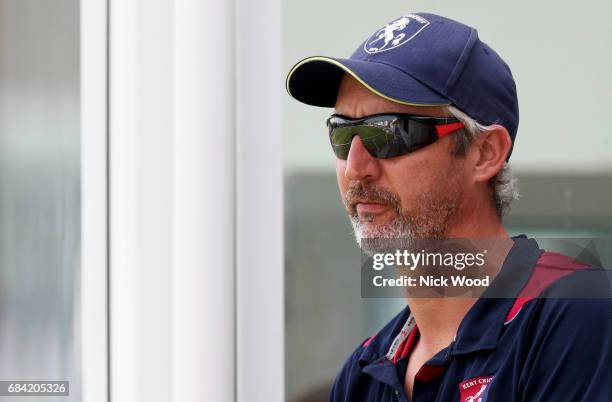 Jason Gillespie of Kent oberves the match action from the players balcony during the Royal London One-Day Cup between Kent and Essex at the Spitfire...