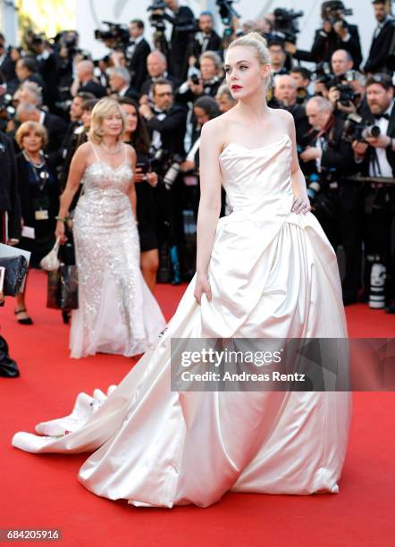 Elle Fanning attends the "Ismael's Ghosts " screening and Opening Gala during the 70th annual Cannes Film Festival at Palais des Festivals on May 17,...