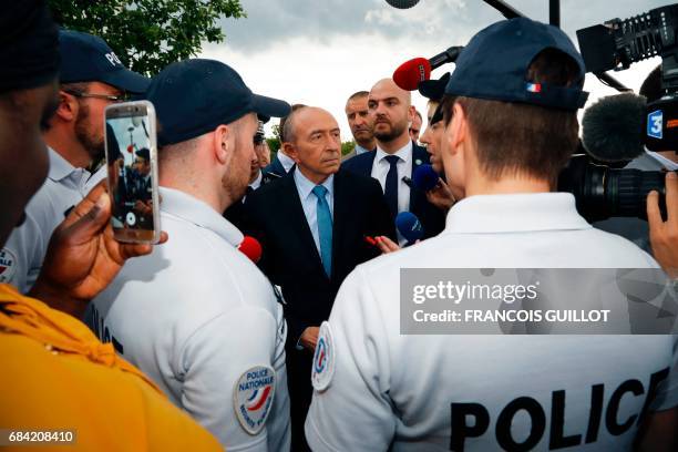 Newly appointed French Interior Minister Gerard Collomb visits the police headquarters in Trappes, near Paris, on May 17 as part of his first...