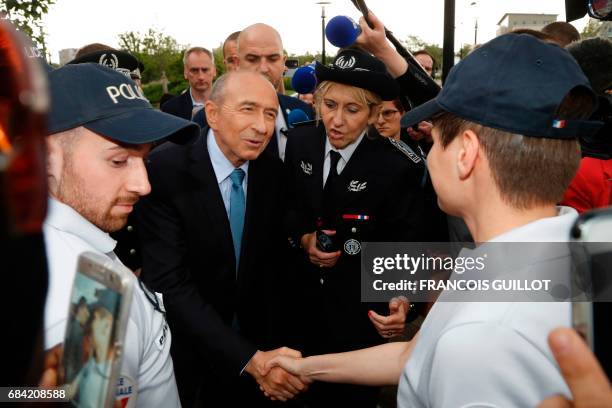 Newly appointed French Interior Minister Gerard Collomb visits the police headquarters in Trappes, near Paris, on May 17 as part of his first...