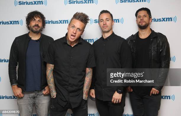 Tony Palermo, Jacoby Shaddix, Jerry Horton and Tobin Esperance of Papa Roach visit at SiriusXM Studios on May 17, 2017 in New York City.