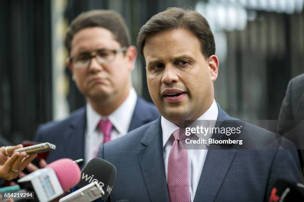 Elias Sanchez, Governor Ricardo Rossello's representative on the federal board, speaks to members of the media outside the Federal Courthouse in San...