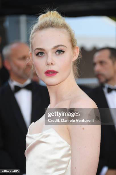 Actress Elle Fanning attends the "Ismael's Ghosts " screening and Opening Gala during the 70th annual Cannes Film Festival at Palais des Festivals on...