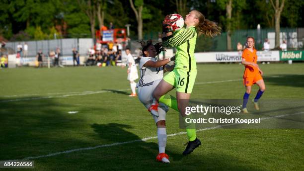 Gia Corley of Germany challenges Regina van Eijk of the Netherlands during the U15 girl's international friendly match between Germany and...