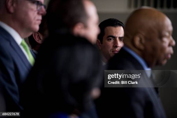 Rep. Ruben Kihuen, D-Nev., and other House Democrats listen as at House Oversight and Government Reform ranking member Elijah Cummings, D-Md., speaks...