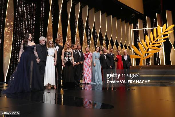 Italian actress and master of ceremonies Monica Belluccion, Spanish director and President of the Feature Film Jury Pedro Almodovar, French-US...