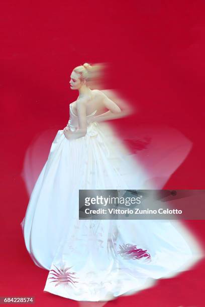 Actress Elle Fanning attends the 'Ismael's Ghosts ' screening and Opening Gala during the Opening Ceremony of the 70th annual Cannes Film Festival at...