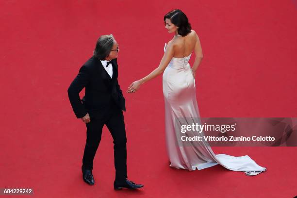 Mohamed Hadid and Bella Hadid attend the 'Ismael's Ghosts ' screening and Opening Gala during the Opening Ceremony of the 70th annual Cannes Film...