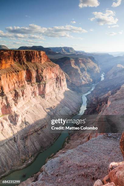 sunset over colorado river, grand canyon, usa - versante nord del grand canyon foto e immagini stock