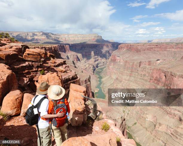 adult couple at grand canyon, arizona, usa - couple grand canyon stock pictures, royalty-free photos & images