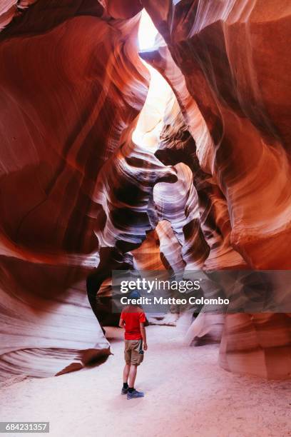 tourist inside slot canyon, arizona, usa - antelope canyon stock pictures, royalty-free photos & images