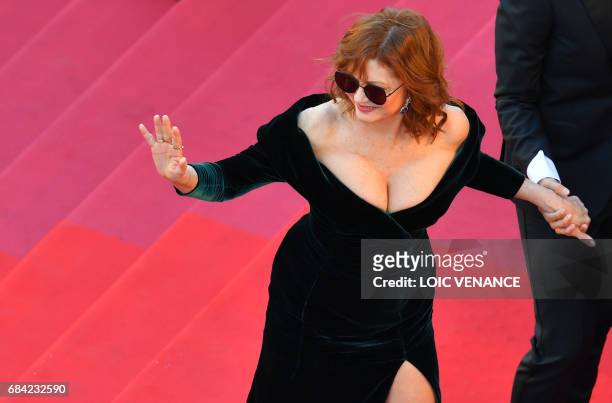 Actress Susan Sarandon waves as she arrives on May 17, 2017 for the screening of the film 'Ismael's Ghosts' during the opening ceremony of the 70th...