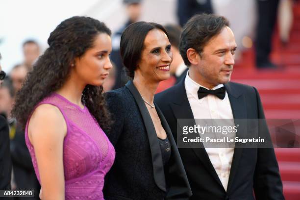 Vincent Perez, Karine Silla and Iman Perez attend the "Ismael's Ghosts " screening and Opening Gala during the 70th annual Cannes Film Festival at...