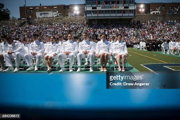 Cadets listen as President Donald Trump delivers the commencement address at the commencement ceremony at the U.S. Coast Guard Academy, May 17, 2017...