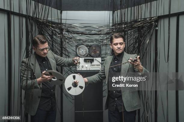 twin sciencetist - tape recorder stock pictures, royalty-free photos & images