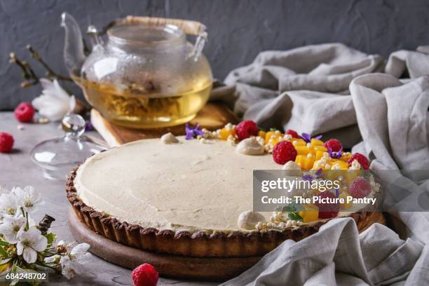 chocolate tart with mango and raspberries - mango stock pictures, royalty-free photos & images