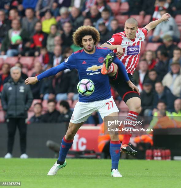 Marouane Fellaini of Manchester United in action with Oriol Romeu of Southampton during the Premier League match between Southampton and Manchester...
