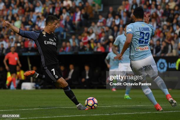 Cristiano Ronaldo of Real Madrid scores the first goal against RC Celta during the La Liga match, between Celta Vigo and Real Madrid at Estadio...