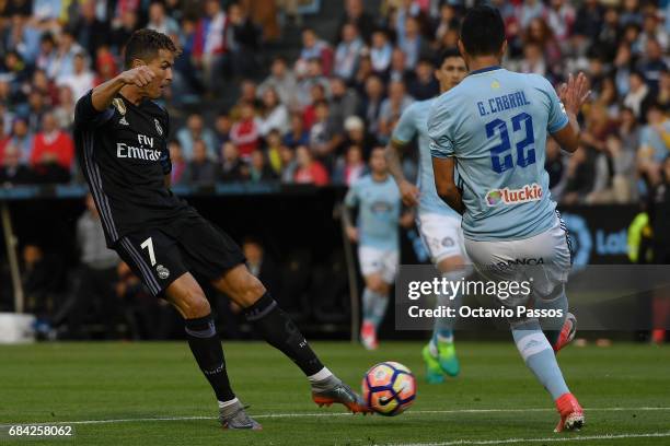 Cristiano Ronaldo of Real Madrid scores the first goal against RC Celta during the La Liga match, between Celta Vigo and Real Madrid at Estadio...