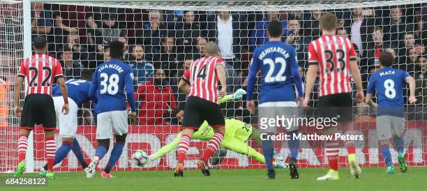 Sergio Romero of Manchester United saves a penalty from Manolo Gabbiani of Southampton during the Premier League match between Southampton and...