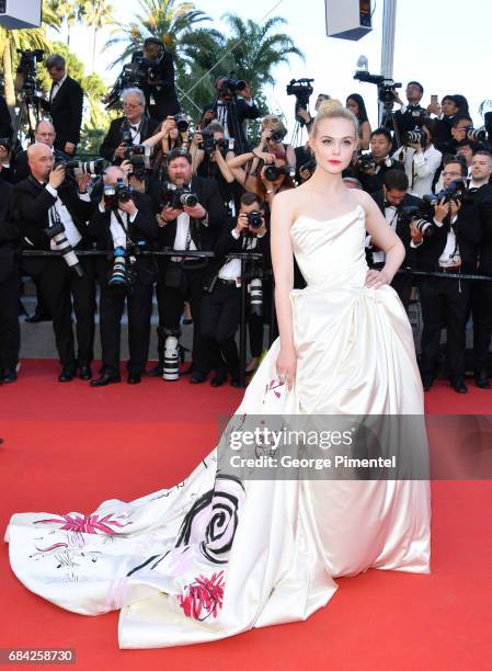 Elle Fanning attends the "Ismael's Ghosts " screening and Opening Gala during the 70th annual Cannes Film Festival at Palais des Festivals on May 17,...