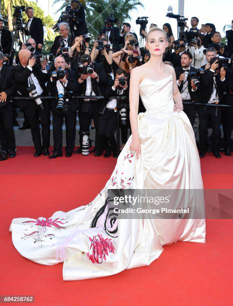 Elle Fanning attends the "Ismael's Ghosts " screening and Opening Gala during the 70th annual Cannes Film Festival at Palais des Festivals on May 17,...