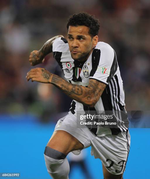 Dani Alves of Juventus FC celebrates after scoring the opening goal during the TIM Cup Final match between SS Lazio and Juventus FC at Olimpico...