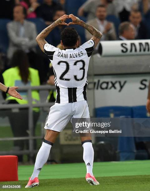 Daniel Alves Da Silva of Juventus FC celebrates after scoring the opening goal during the TIM Cup Final match between SS Lazio and Juventus FC at...