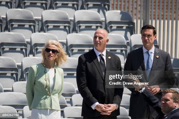 Kellyanne Conway , counselor to President Donald Trump, and Keith Schiller , President Trump's longtime bodyguard, arrive at the commencement...