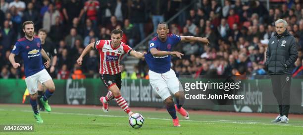 Anthony Martial of Manchester United in action with Cedric Soares of Southampton during the Premier League match between Southampton and Manchester...