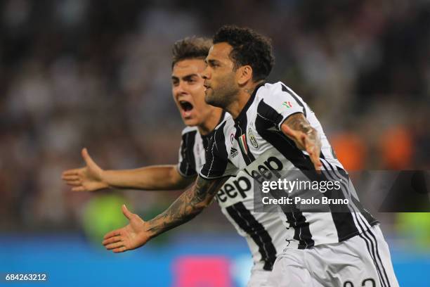 Dani Alves and Paulo Dybala of Juventus FC celebrates after scoring the opening goal during the TIM Cup Final match between SS Lazio and Juventus FC...