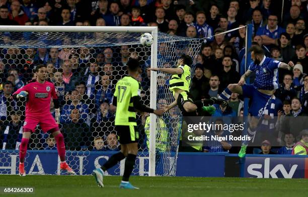 Steven Fletcher of Sheffield Wednesday scores his sides first goal past Danny Ward of Huddersfield Town during the Sky Bet Championship play off semi...