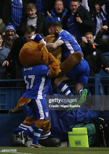 Steven Fletcher of Sheffield Wednesday celebrates scoring his sides first goal with the Sheffield Wednesday mascots during the Sky Bet Championship...