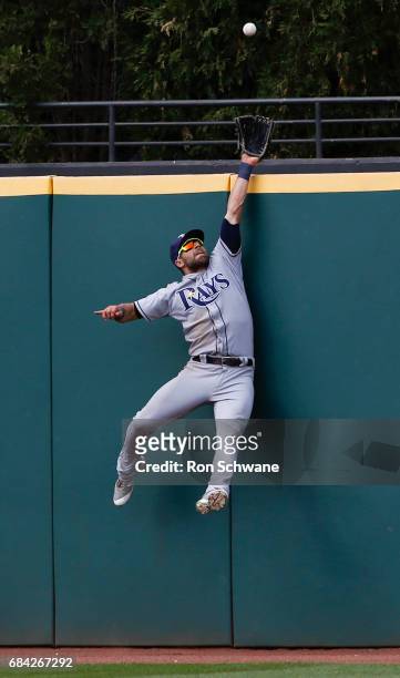 Kevin Kiermaier of the Tampa Bay Rays makes a leaping catch to get out Jason Kipnis of the Cleveland Indians during the ninth inning at Progressive...
