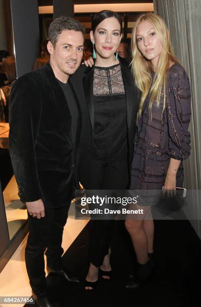 Dave Gardner, Liv Tyler and Ella Richards attend the launch of the KATE MOSS X ARA VARTANIAN collection on May 17, 2017 in London, England.