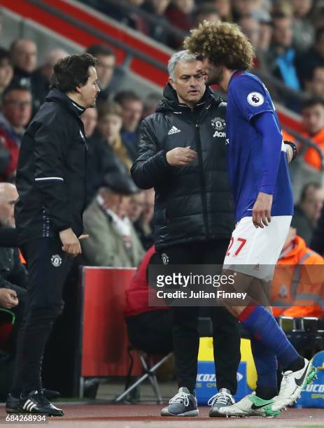 Jose Mourinho, Manager of Manchester United shakes hands with Marouane Fellaini of Manchester United during the Premier League match between...
