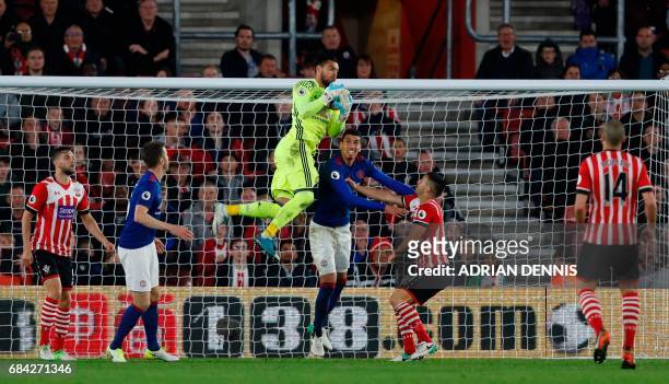 Manchester United's Argentinian goalkeeper Sergio Romero claims the ball during the English Premier League football match between Southampton and...