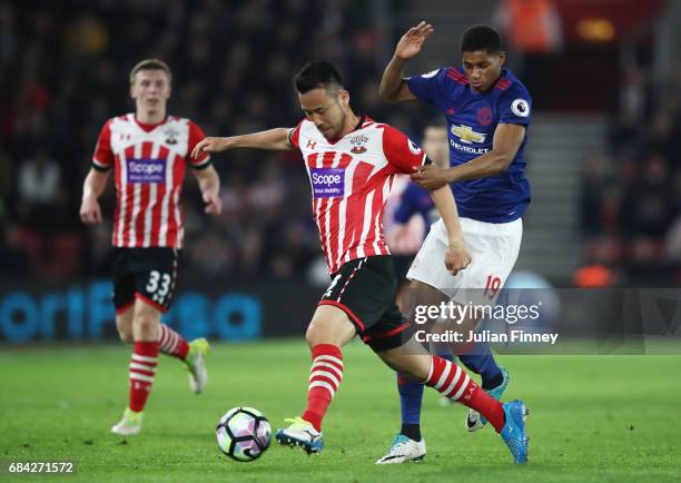 Maya Yoshida of Southampton and Marcus Rashford of Manchester United battle for possession during the Premier League match between Southampton and...