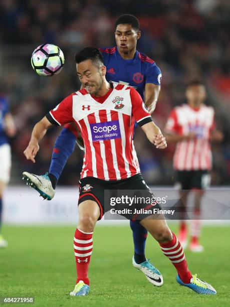 Maya Yoshida of Southampton and Marcus Rashford of Manchester United battle for possession during the Premier League match between Southampton and...