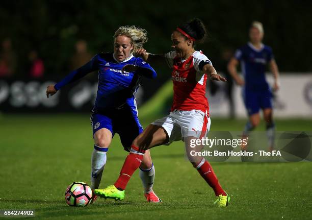 Gemma Davison of Chelsea is tackled by Alex Scott of Arsenal during the WSL 1 match between Chelsea Ladies and Arsenal Ladies on May 17, 2017 in...